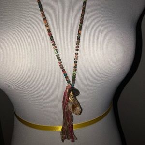 Multicolored necklace with tassel and two charms